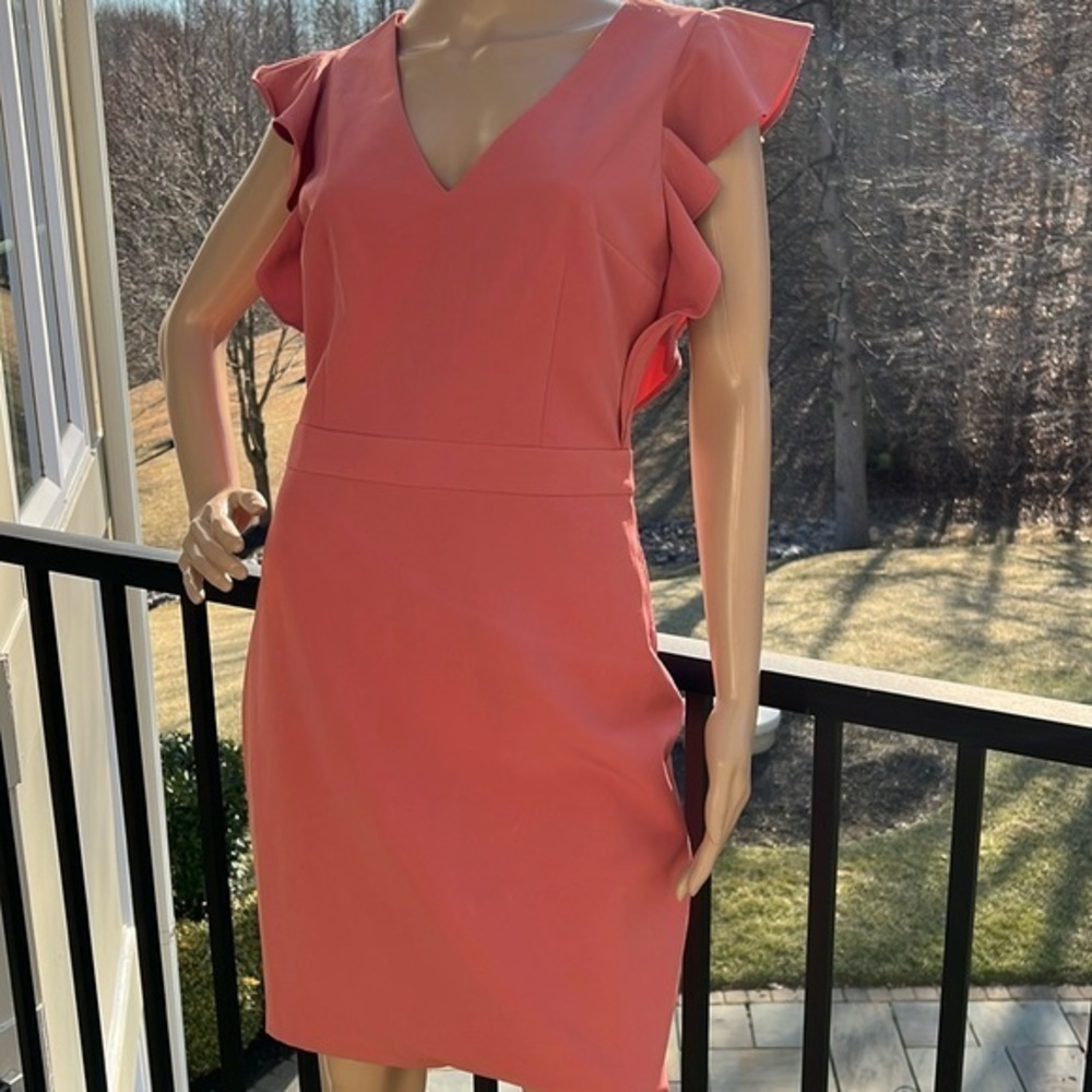 Express beautiful coral flutter ruffle sleeve cocktail dress